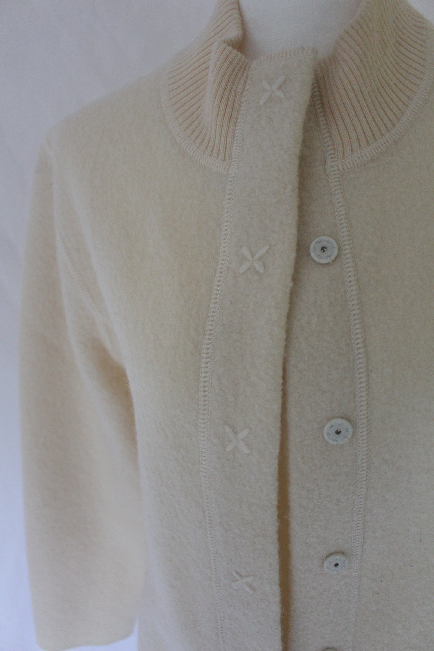 crisscross stitch on cream vintage cardigan, ski shop cardigan