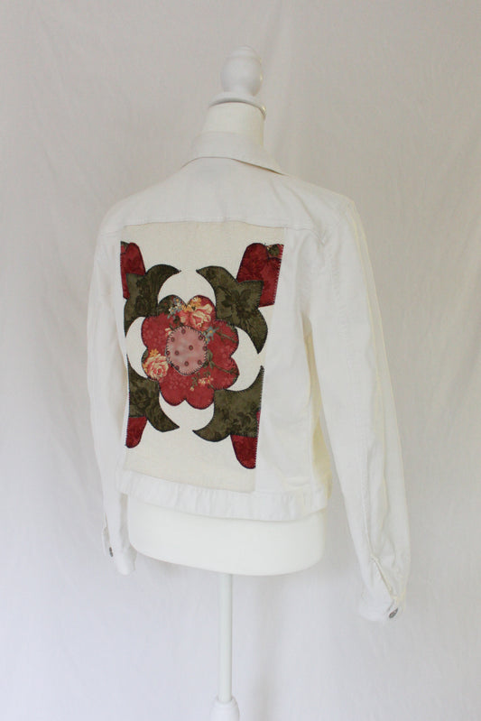 white denim jacket with quilt block on the back, upcycled denim jacket, upcycled quilt on white jean jacket