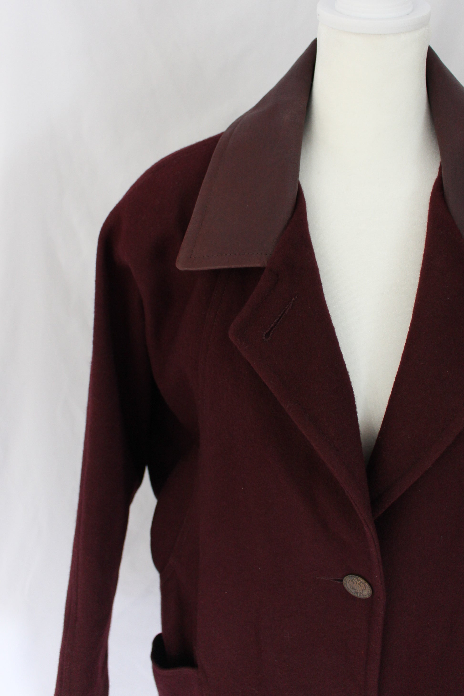 burgundy winter coat with coin buttons and leather collar