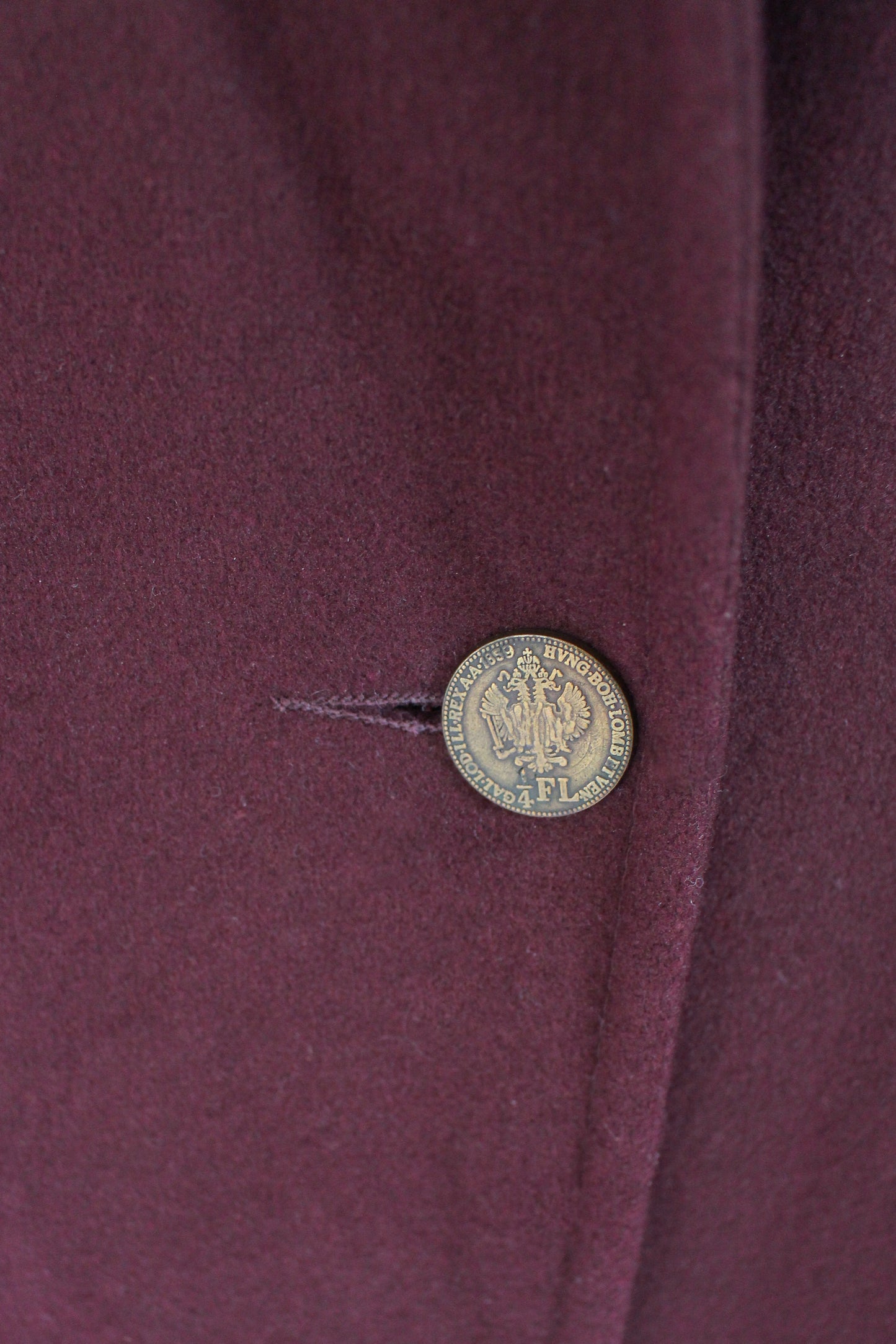 coin button on winter coat