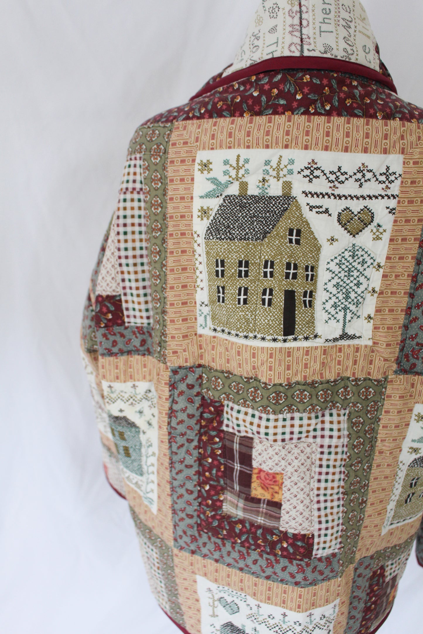 handmade quilt jacket with house scene