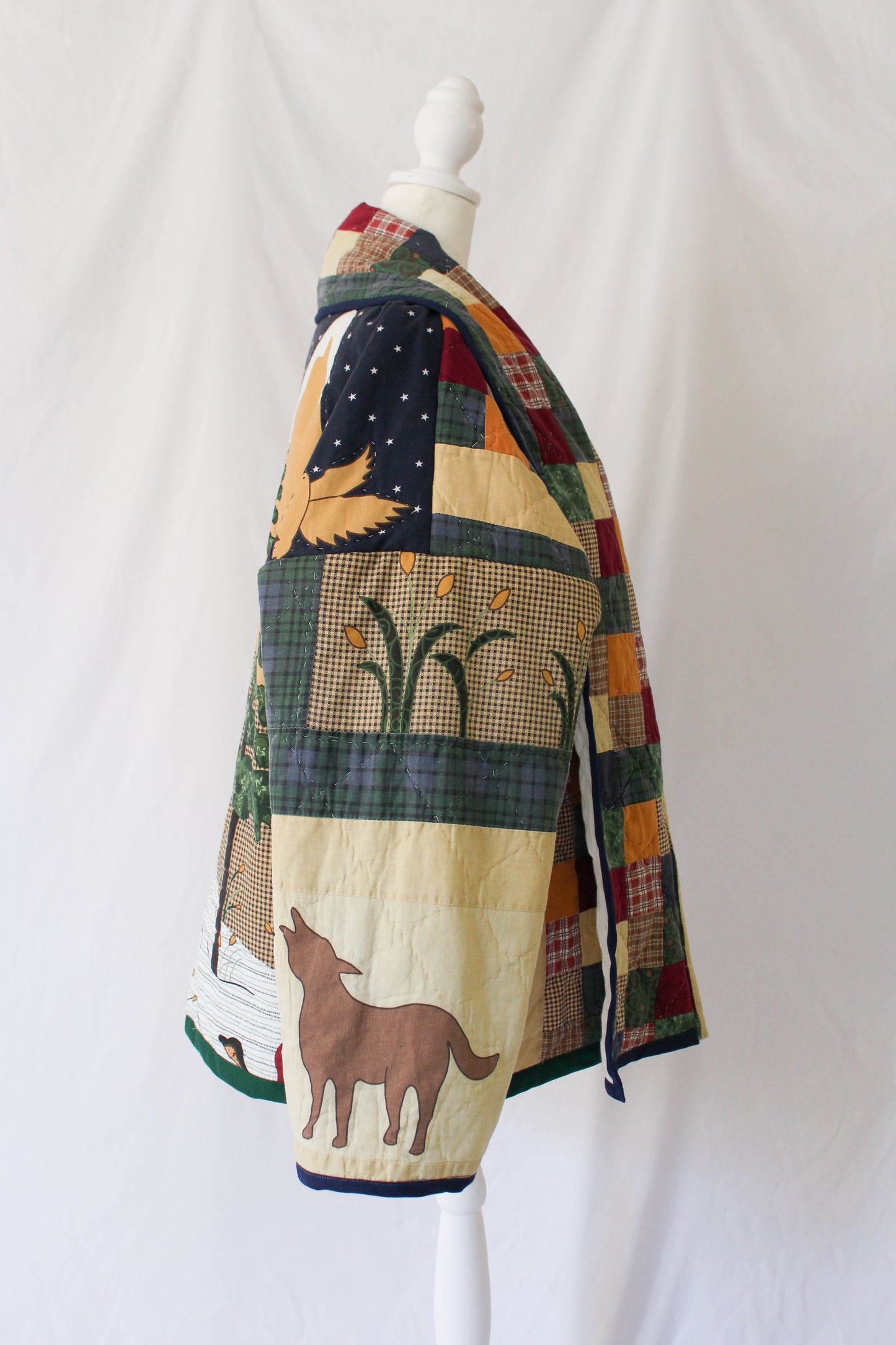 quilt jacket with coyote or wolf on sleeve