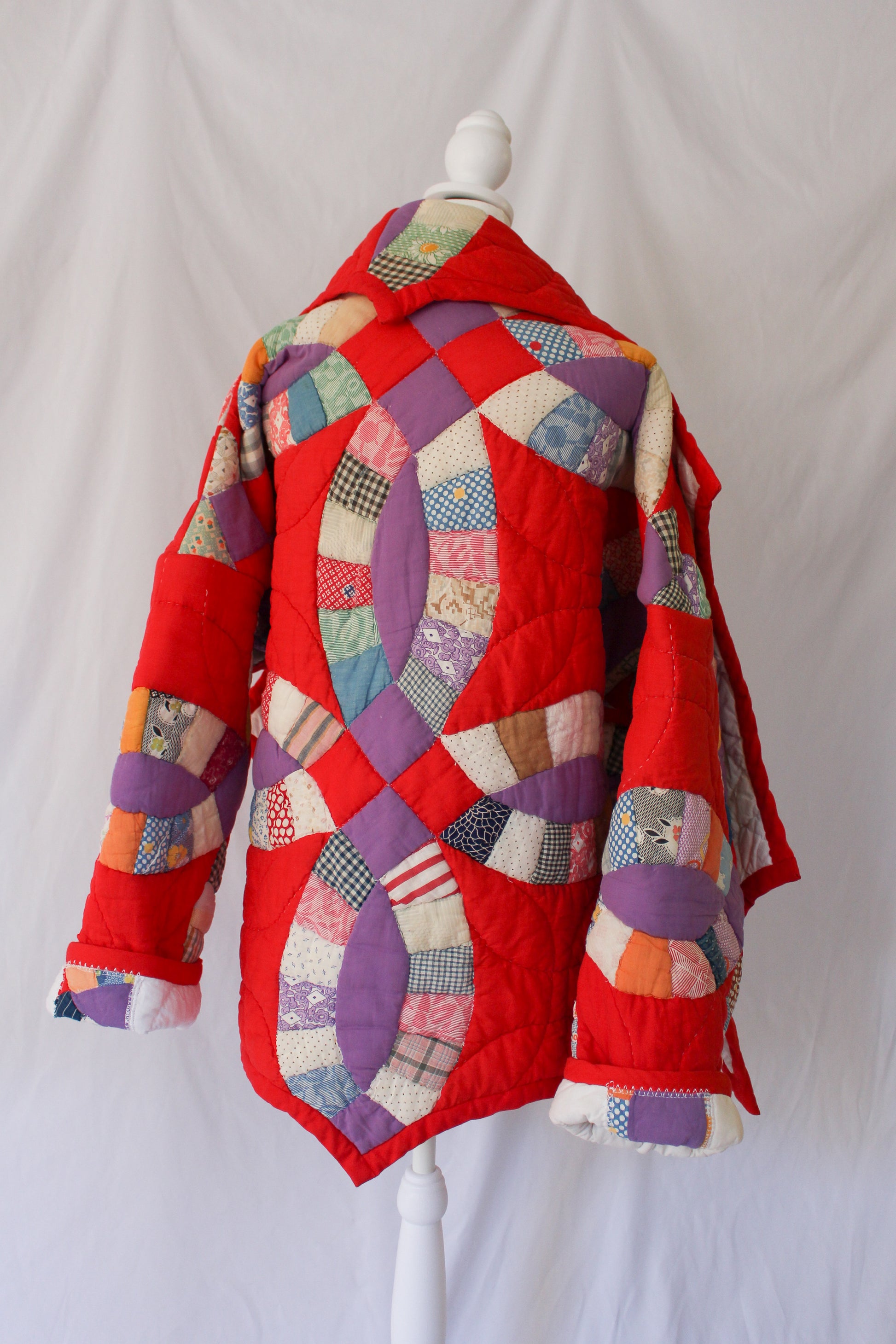 puffy red quilt coat with double wedding ring pattern