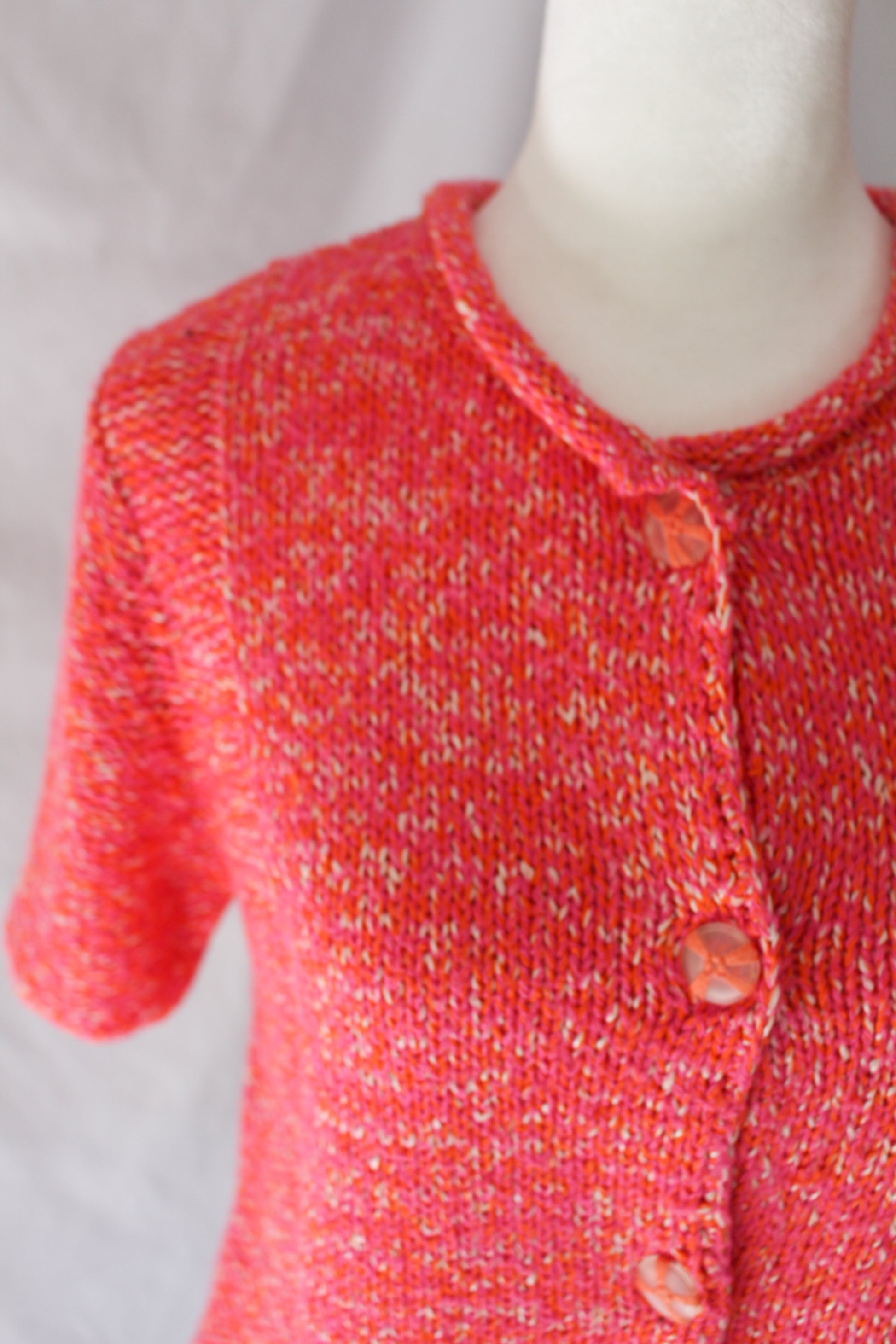 pink and orange knit sweater cardigan short sleeves