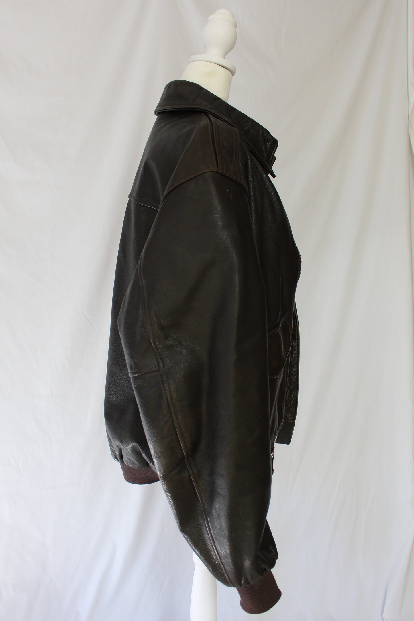 side of brown leather bomber