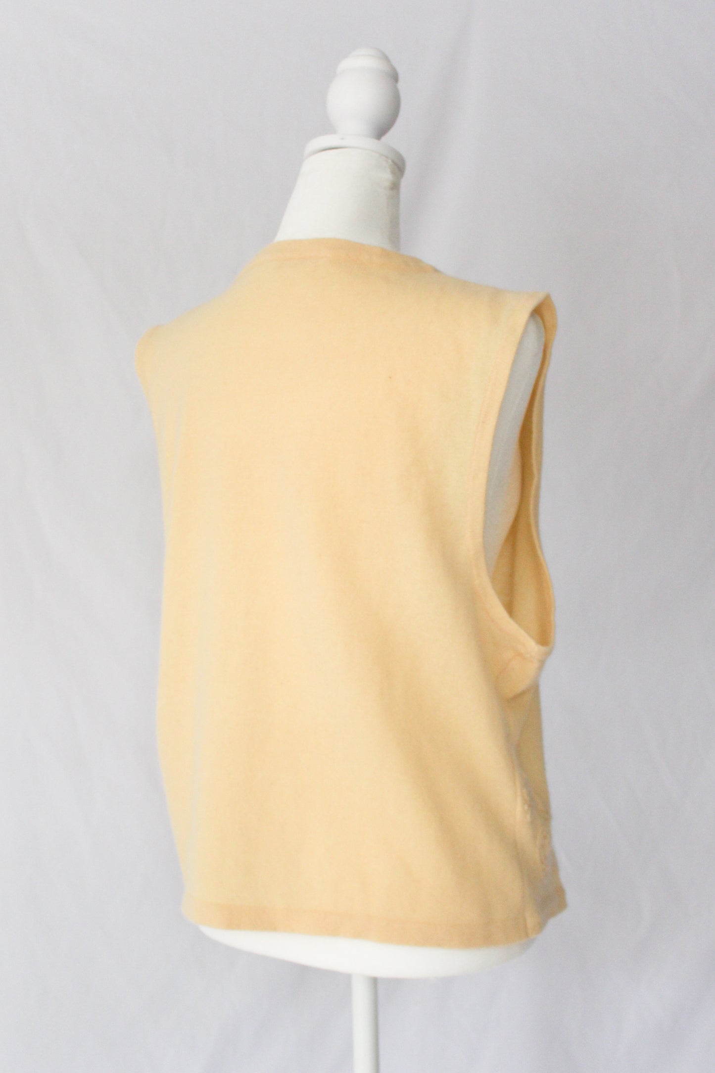 yellow knit vest